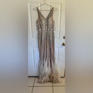 Size 4 Jovani 55796 ivory sleeveless embellished V neck sheath feathered gownGUC